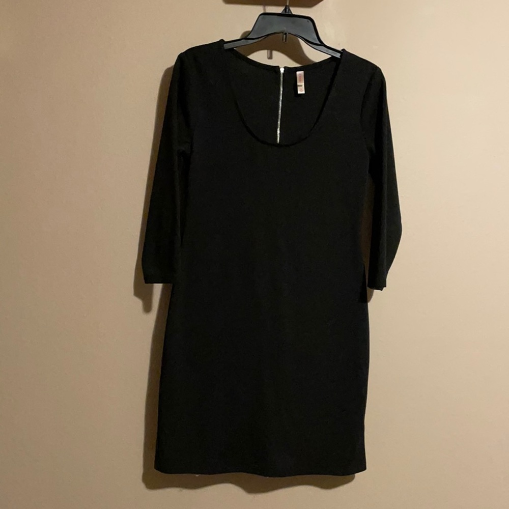 Size medium, 3/4 sleeve, black, body-con dress. Brand Xhilaration.